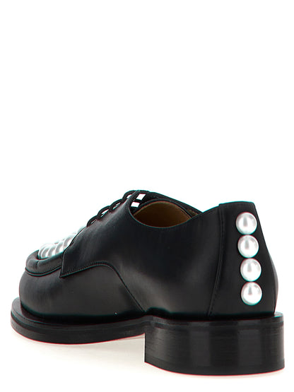 Lace-Up Shoes by MACH & MACH for unisex in calfskin leather bicolour, black & white showcases a timeless silhouette from the Unisex Calfskin Leather Lace-Up Shoes collection, featuring a timeless and for a timeless finish.