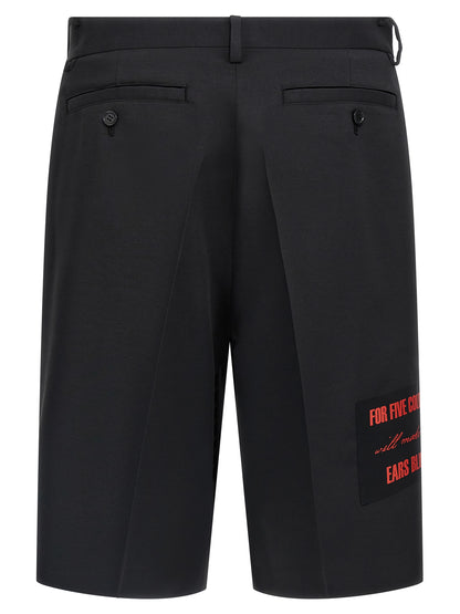 Bermuda Shorts by Undercover for men in wool & polyester black presents a contemporary silhouette, showcasing a contemporary with a refined short and elegant .