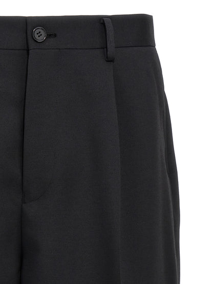 Bermuda Shorts by Undercover for men in wool & polyester black presents a sleek silhouette, featuring a sleek with a refined short and a sophisticated .