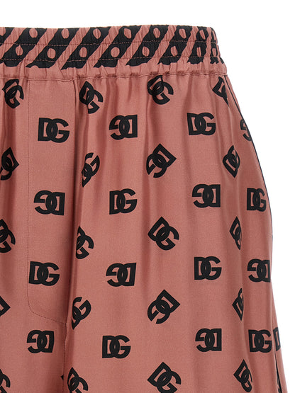 Bermuda Shorts by Dolce & Gabbana for women in silk satin multicolor & pink presents a contemporary silhouette, showcasing a contemporary with a refined short and elegant .