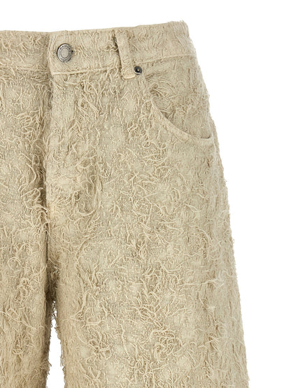 Denim Shorts by Haikure for women in denim cotton & fur beige features an magnificent silhouette, showcasing a magnificent relaxed-fit & wide with a short and for a premium, sophisticated aesthetic.