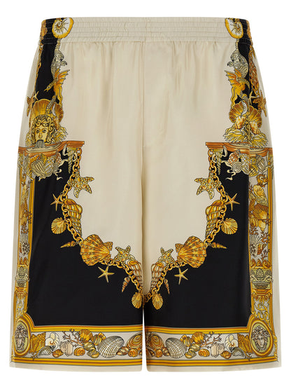 Bermuda Shorts by Versace for men in silk multicolor & print presents a sleek silhouette, featuring a sleek wide with a refined short and a sophisticated .