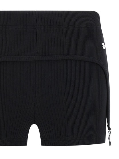 Bermuda Shorts by Jean Paul Gaultier for women in cotton black presents a sleek silhouette, featuring a sleek with a refined short and a sophisticated .