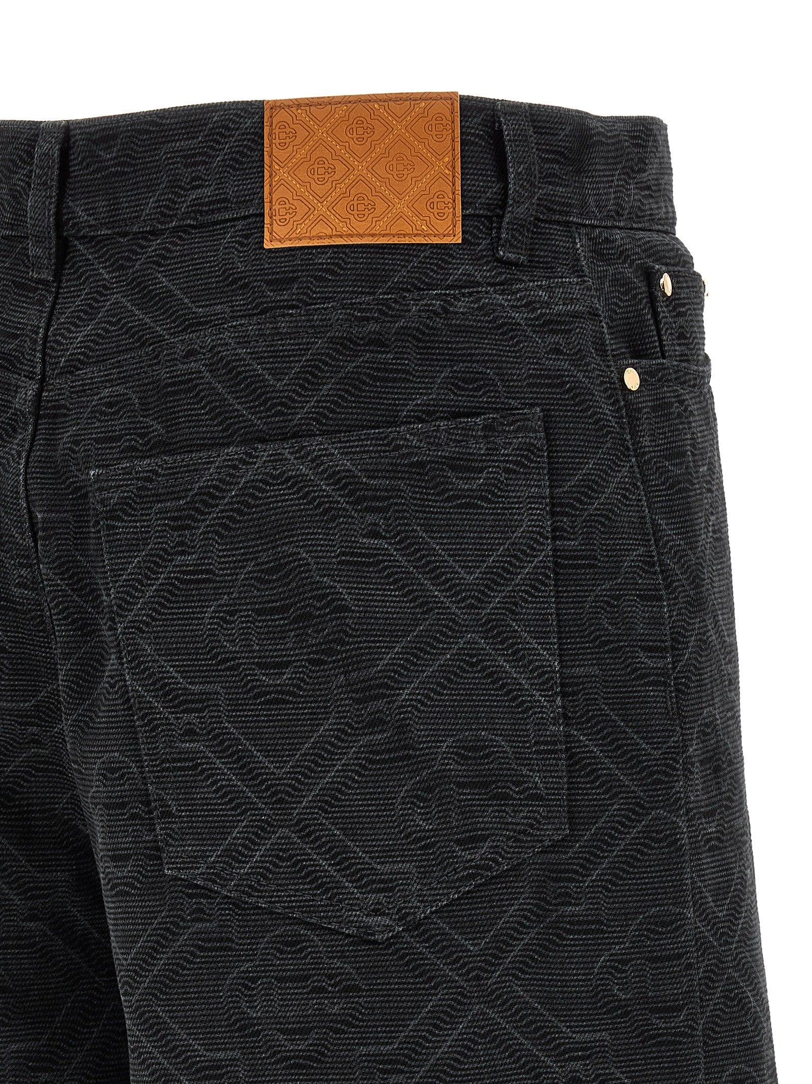 Denim Shorts by Casablanca for men in cotton denim black & monogram features an utilitarian chic relaxed-fit & wide with a short and , creating a utilitarian chic silhouette perfect for elevated casual styling.