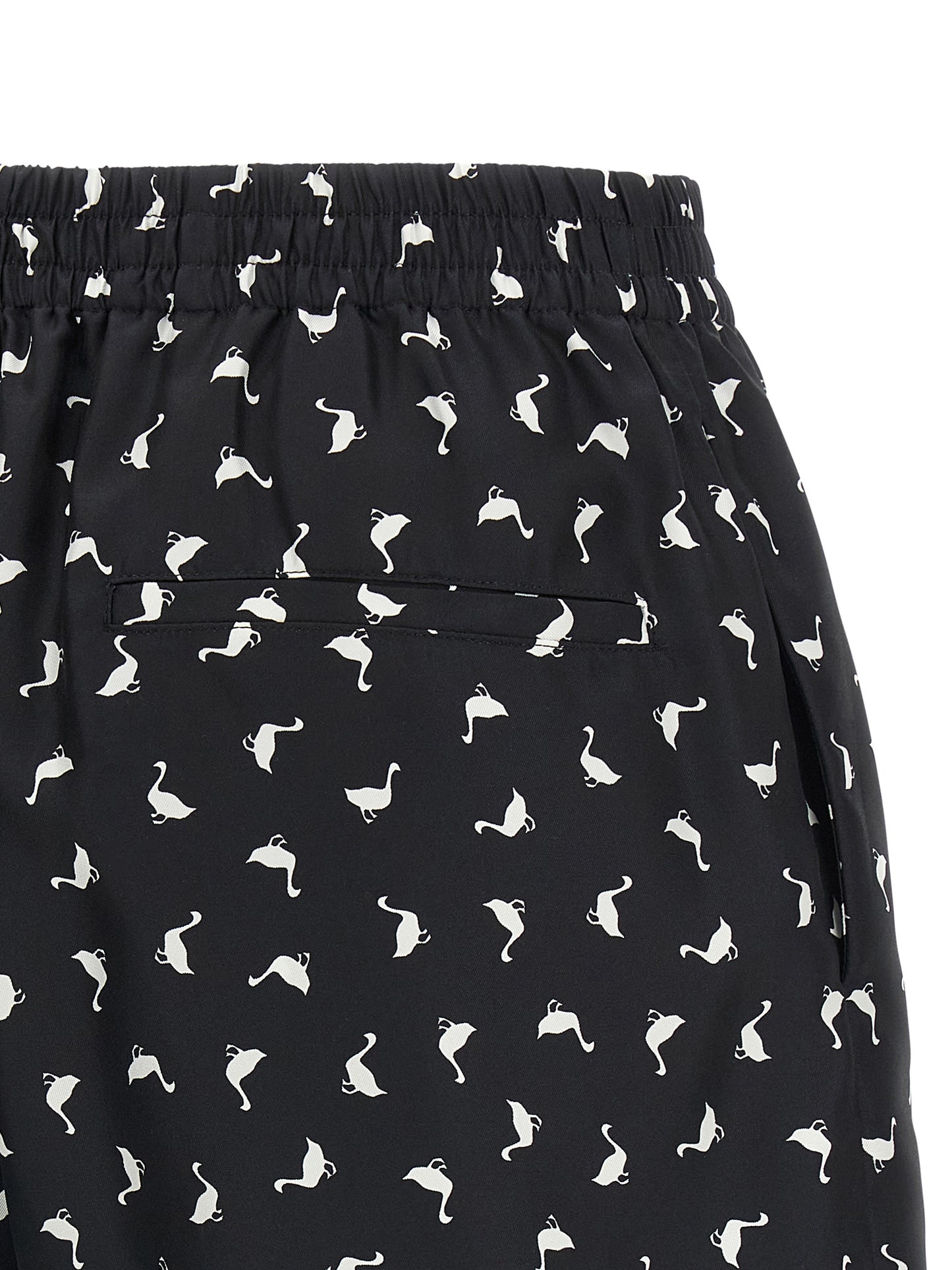 Cargo Shorts by Moschino for women in silk twill bicolour, black, white & print features an utilitarian design, highlighting a utilitarian and short cut with a comfortable for a sophisticated, premium look.