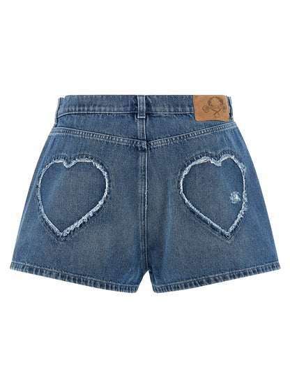 Shorts by Moschino for women in denim cotton blue features a architectural silhouette, showcasing a architectural and short defined by a sophisticated for a premium, elevated aesthetic.