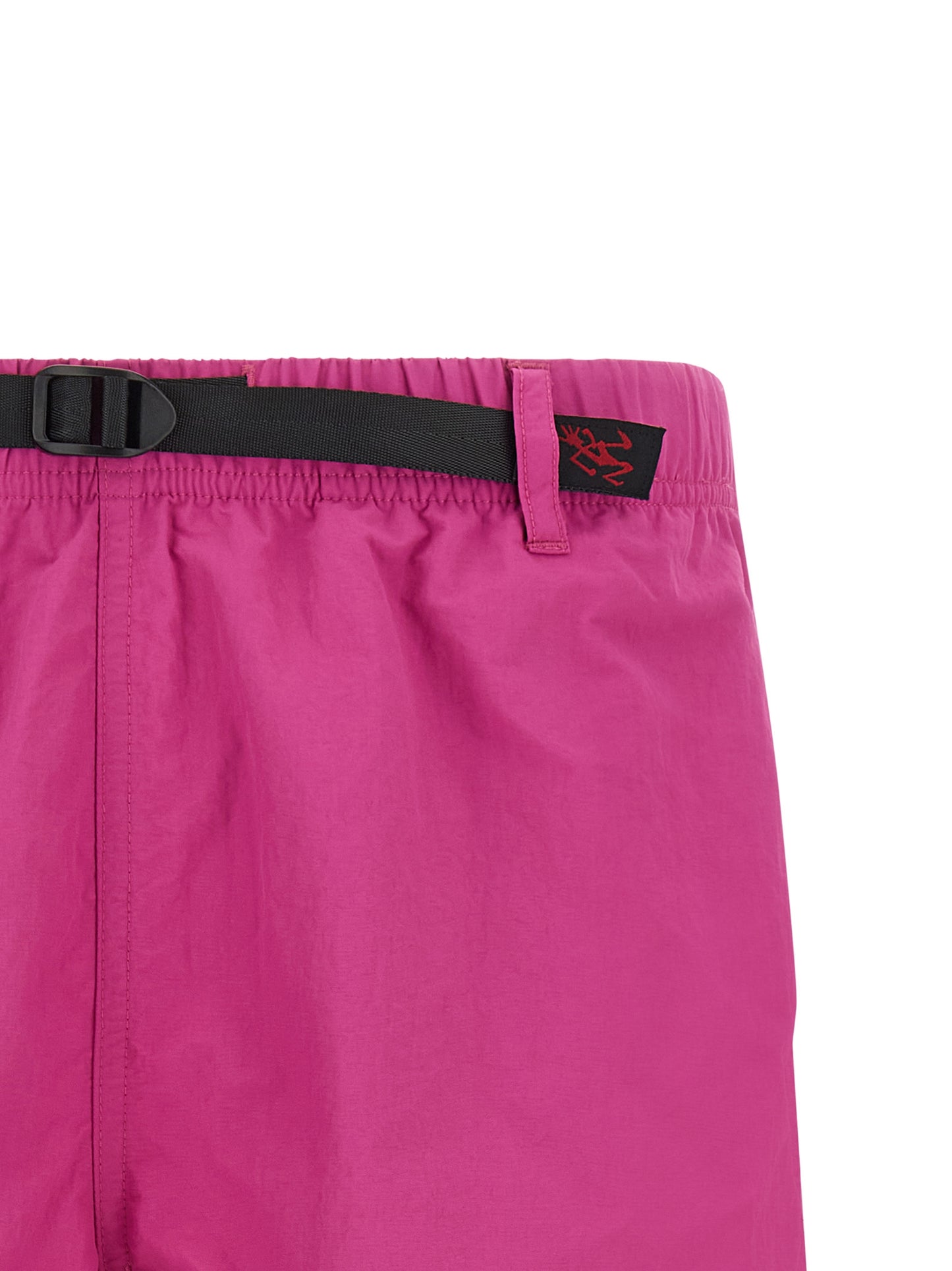 Bermuda Shorts by Gramicci for men in nylon fuchsia presents a contemporary silhouette, showcasing a contemporary with a refined short and elegant .