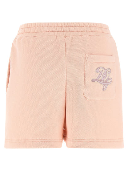 Bermuda Shorts by Dolce & Gabbana for women in cotton terry cloth multicolor & pink showcases a on trend silhouette, featuring a tailored with a classic short and sophisticated for a on trend finish.