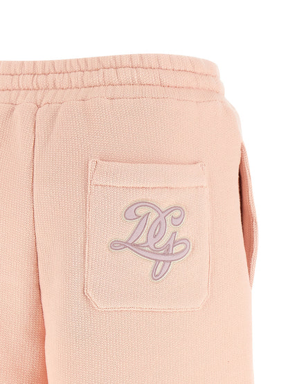 Bermuda Shorts by Dolce & Gabbana for women in cotton terry cloth multicolor & pink features a sartorial silhouette, showcasing a sartorial and short with a sophisticated for a sartorial look.
