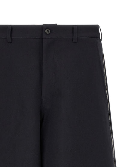 Bermuda Shorts by Comme Des Garçons for men in polyester blue & herringbone presents a contemporary silhouette, showcasing a contemporary wide with a refined short and elegant .