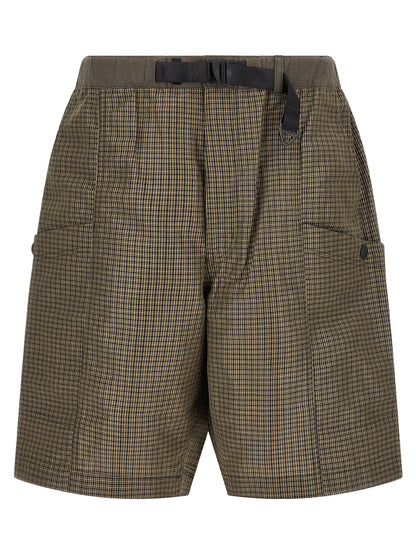 Bermuda Shorts by Comme Des Garçons for men in linen & polyester bicolour, green & patterned features an nuanced silhouette, showcasing a nuanced wide with a short cut and for a sophisticated, premium finish.