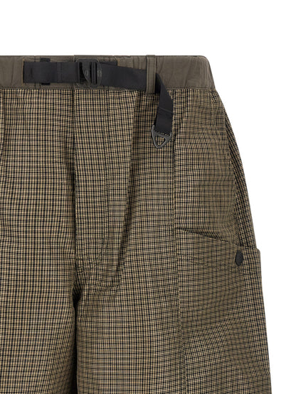 Bermuda Shorts by Comme Des Garçons for men in linen & polyester bicolour, green & patterned presents a contemporary silhouette, showcasing a contemporary wide with a refined short and elegant .