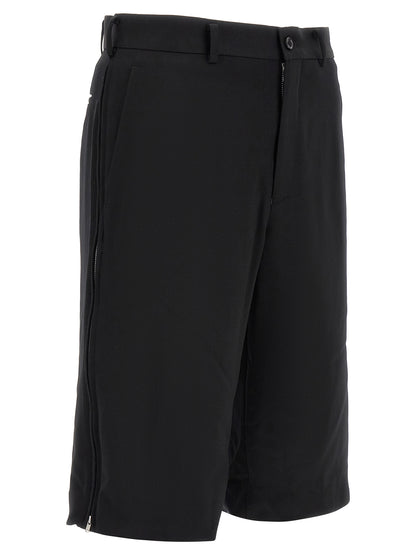 Bermuda Shorts by Comme Des Garçons for men in wool black features a eye catching straight-leg, flared & wide and short with a eye catching .