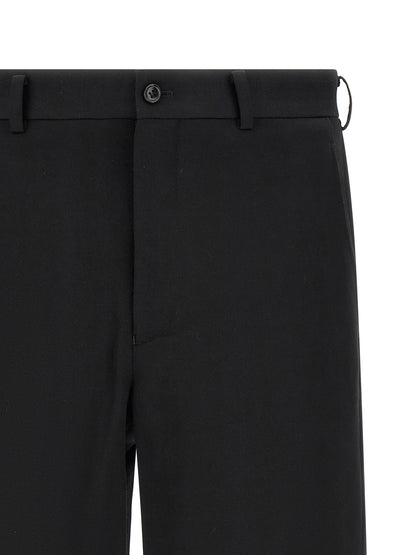 Bermuda Shorts by Comme Des Garçons for men in wool black showcases a on trend silhouette, featuring a tailored straight-leg, flared & wide with a classic short and sophisticated for a on trend finish.