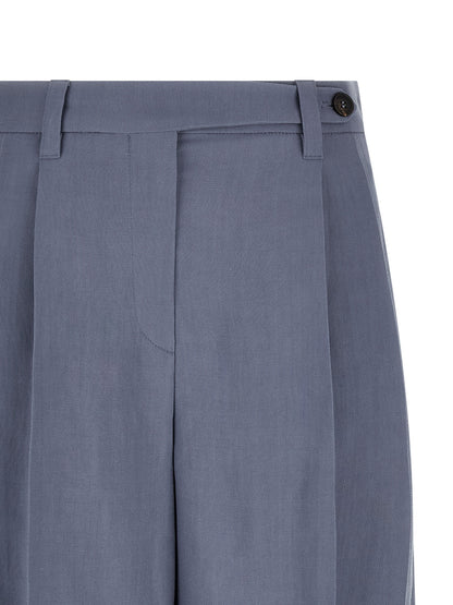 Bermuda Shorts by Brunello Cucinelli for women in viscose linen twill blue presents a sleek silhouette, featuring a sleek wide with a refined short and a sophisticated .