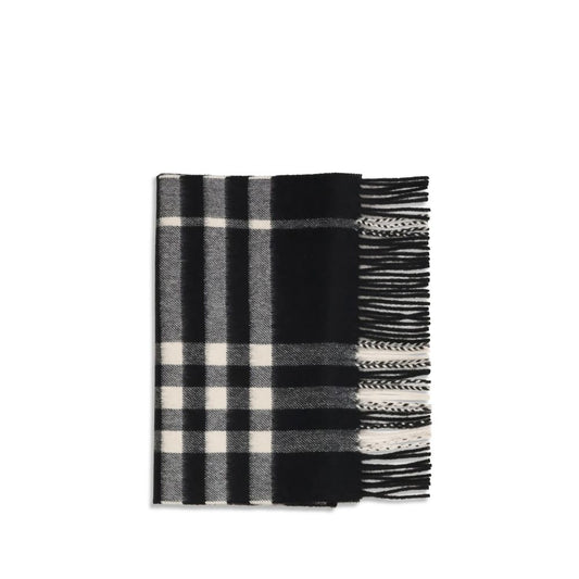 Scarf by Burberry for women in cashmere & capra leather black showcases a warm silhouette from the Cashmere & Capra Leather Fringes Scarf collection, offering a warm drape that exudes sophisticated luxury.