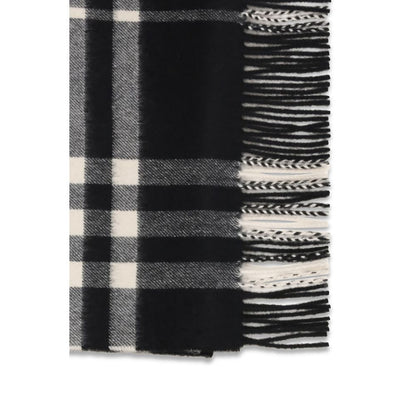 Scarf by Burberry for women in cashmere & capra leather black features a snug silhouette, perfectly showcasing the elegant drape and premium finish of the Cashmere & Capra Leather Fringes Scarf.
