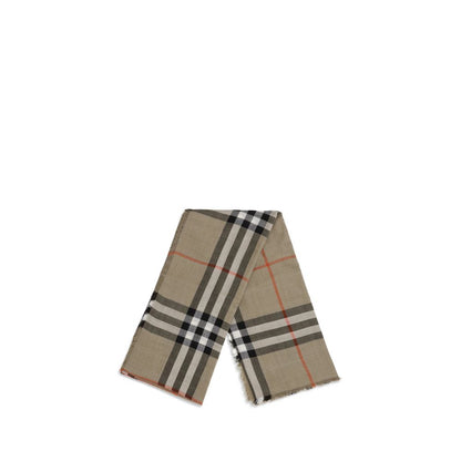 Scarf by Burberry for men in wool & silk beige, brown, sand & print presents a effortlessly chic silhouette, artfully capturing the essence of the effortlessly chic Wool & Silk Shawl Fringes Scarf design for a sophisticated look.