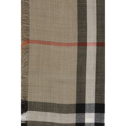 Scarf by Burberry for men in wool & silk beige, brown, sand & print showcases a eye catching silhouette, artfully capturing the essence of the eye catching Wool & Silk Shawl Fringes Scarf design for a sophisticated look.