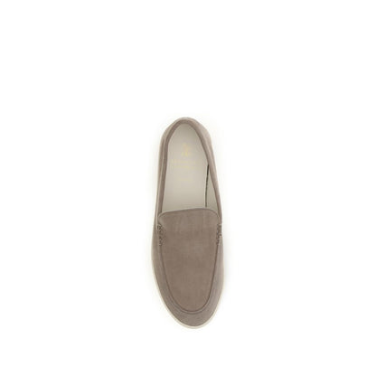 Flat Loafer Slip-On Shoes by Brunello Cucinelli for men in bos taurus calf suede leather gray showcases a impeccable silhouette as Men's Bos Taurus Calf Suede Leather Flat Loafer Slip-On Shoes, artfully designed with a impeccable flat and refined for a impeccable finish.