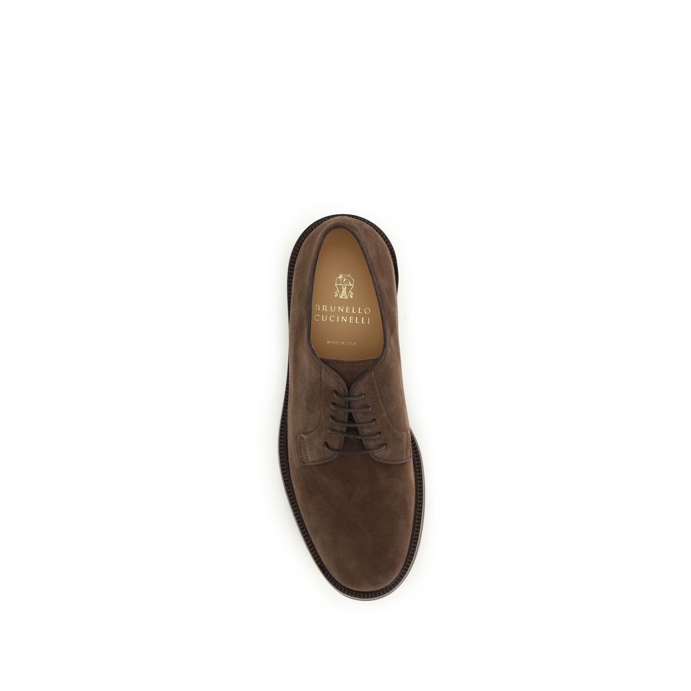 Lace-Up Shoes by Brunello Cucinelli for men in bos taurus calf suede leather brown showcases a impeccable silhouette as Men's Bos Taurus Calf Suede Leather Lace-Up Shoes, artfully designed with a impeccable and refined round toe style for a impeccable finish.