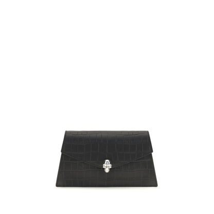 Mini Drawstring Clutch Shoulder Bag by Alexander McQueen for women in bos taurus leather black & silver features a enviable silhouette, showcasing a secure magnetic, ample cardholder, and enviable for a enviable finish.