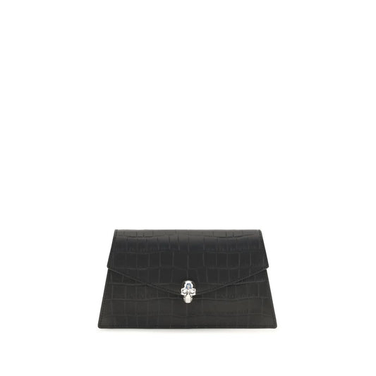 Mini Drawstring Clutch Shoulder Bag by Alexander McQueen for women in bos taurus leather black & silver features a enviable silhouette, showcasing a secure magnetic, ample cardholder, and enviable for a enviable finish.