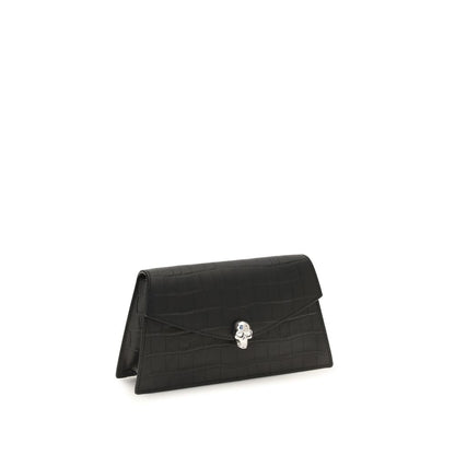 Mini Drawstring Clutch Shoulder Bag by Alexander McQueen for women in bos taurus leather black & silver showcases a enviable silhouette, artfully detailed with a secure magnetic, organized cardholder, and versatile for a enviable look.
