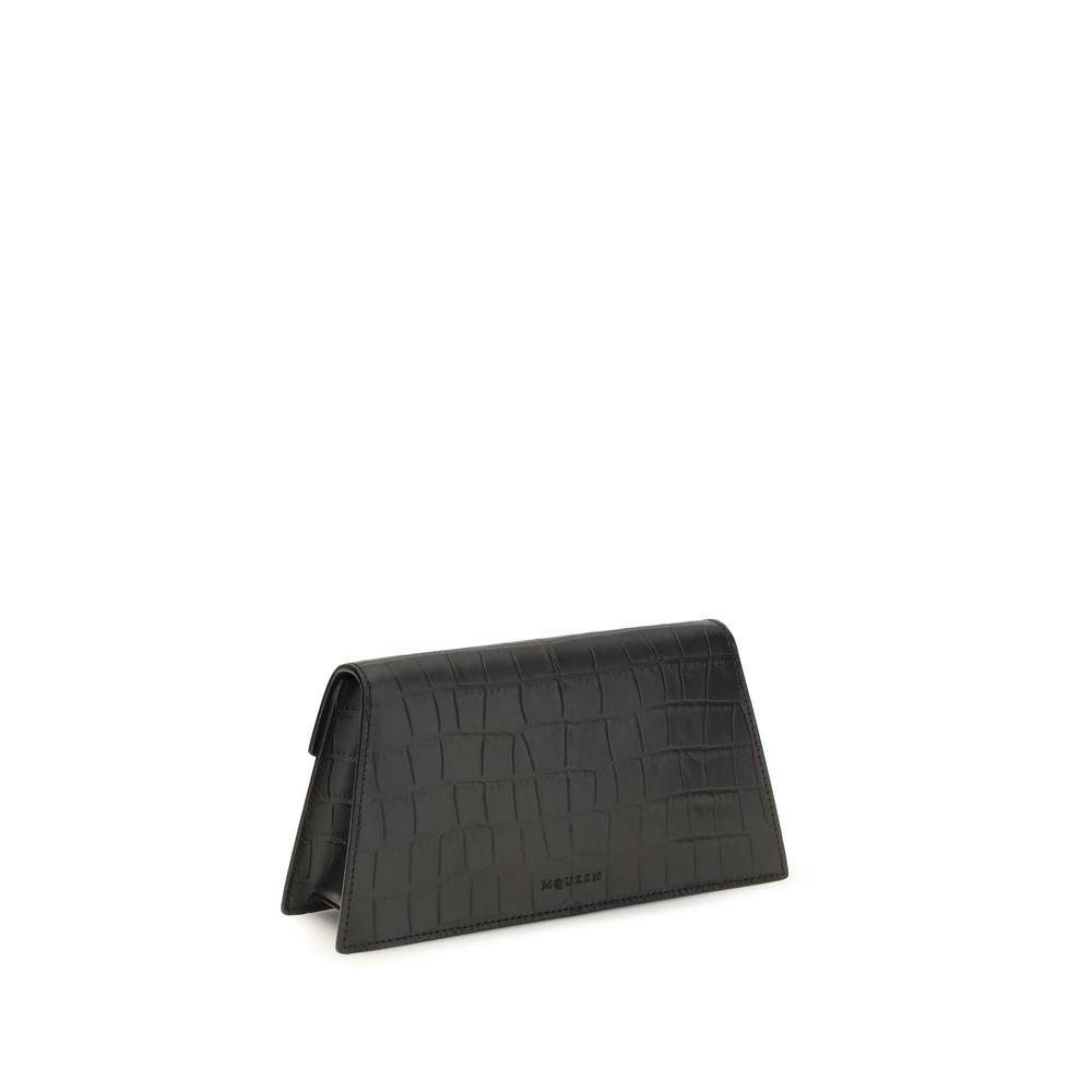 Mini Drawstring Clutch Shoulder Bag by Alexander McQueen for women in bos taurus leather black & silver features a effortless sophistication silhouette, secured by a magnetic with ample cardholder and versatile for a effortless sophistication finish.