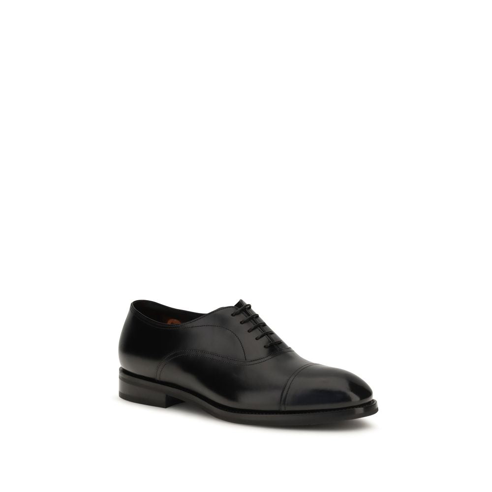 Lace-Up Shoes by Santoni for men in bos taurus calfskin leather black features an ergonomic silhouette, perfectly showcasing Men's Bos Taurus Calfskin Leather Lace-Up Shoes with its distinct and elegant .