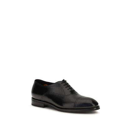 Lace-Up Shoes by Santoni for men in bos taurus calfskin leather black features an ergonomic silhouette, perfectly showcasing Men's Bos Taurus Calfskin Leather Lace-Up Shoes with its distinct and elegant .