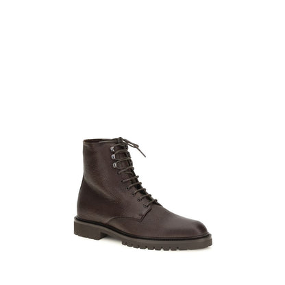 Lace-Up Ankle Boots by Brunello Cucinelli for men in bos taurus calf leather brown features an avant-garde Men's Bos Taurus Calf Leather Lace-Up Ankle Boots silhouette, defined by a sophisticated and a avant-garde round toe style.