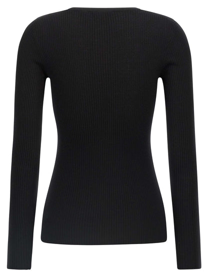 Cardigan by Theory for women in merino wool black showcases a luxurious silhouette, meticulously detailed with a sophisticated and for a refined finish.