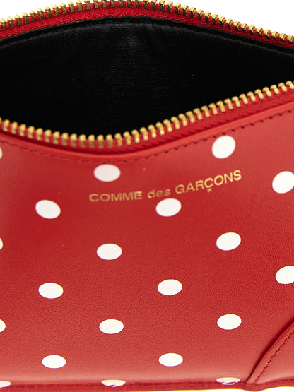 Cardholder Card Case by Comme Des Garçons for unisex in calfskin leather multicolor, red, dots & print features a polished Calfskin Leather Cardholder Card Case design with polished card-organization.