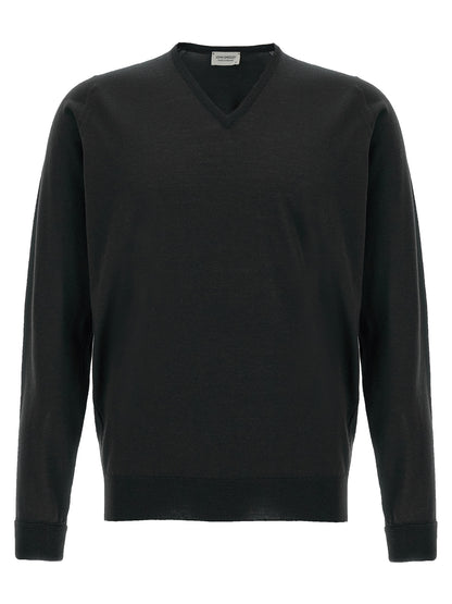 Cardigan by JOHN SMEDLEY for men in merino wool black showcases a luxurious silhouette, meticulously detailed with a sophisticated v-neck neckline and long-sleeve for a refined finish.