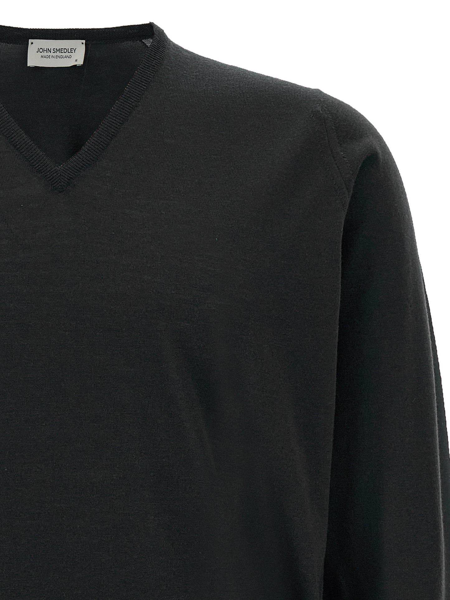 Cardigan by JOHN SMEDLEY for men in merino wool black features a dramatic silhouette, showcasing a sophisticated v-neck neckline and dramatic detail for a timeless, premium look.