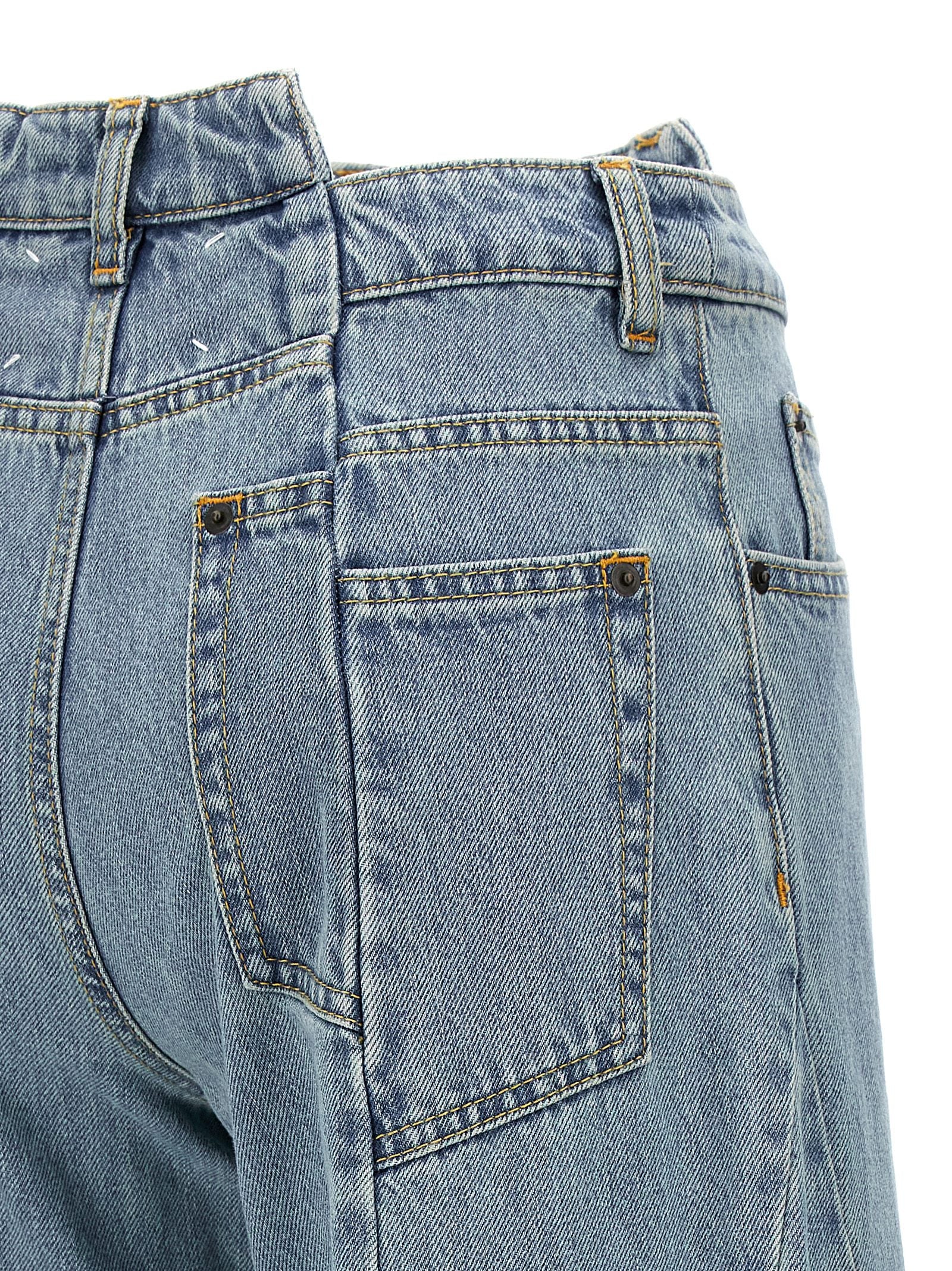 Jeans by Maison Margiela for women in denim cotton light-blue features an refined tailoring silhouette, showcasing a premium wide with a and long cut for a refined tailoring look.