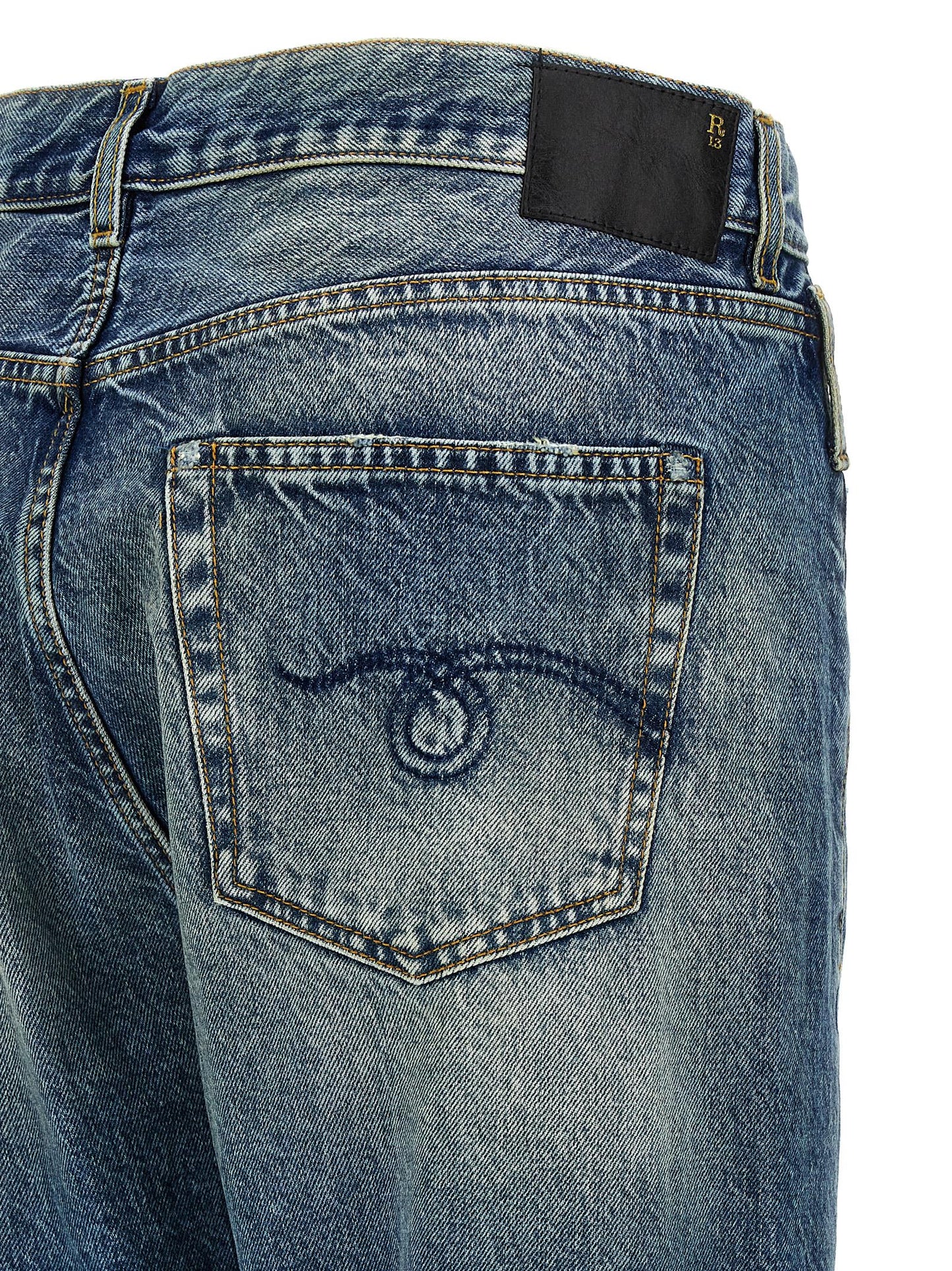 Jeans by R13 for women in cotton denim & patent leather blue & signature presents a tailored silhouette, showcasing a tailored straight-leg and long cut with a refined for a truly tailored aesthetic.