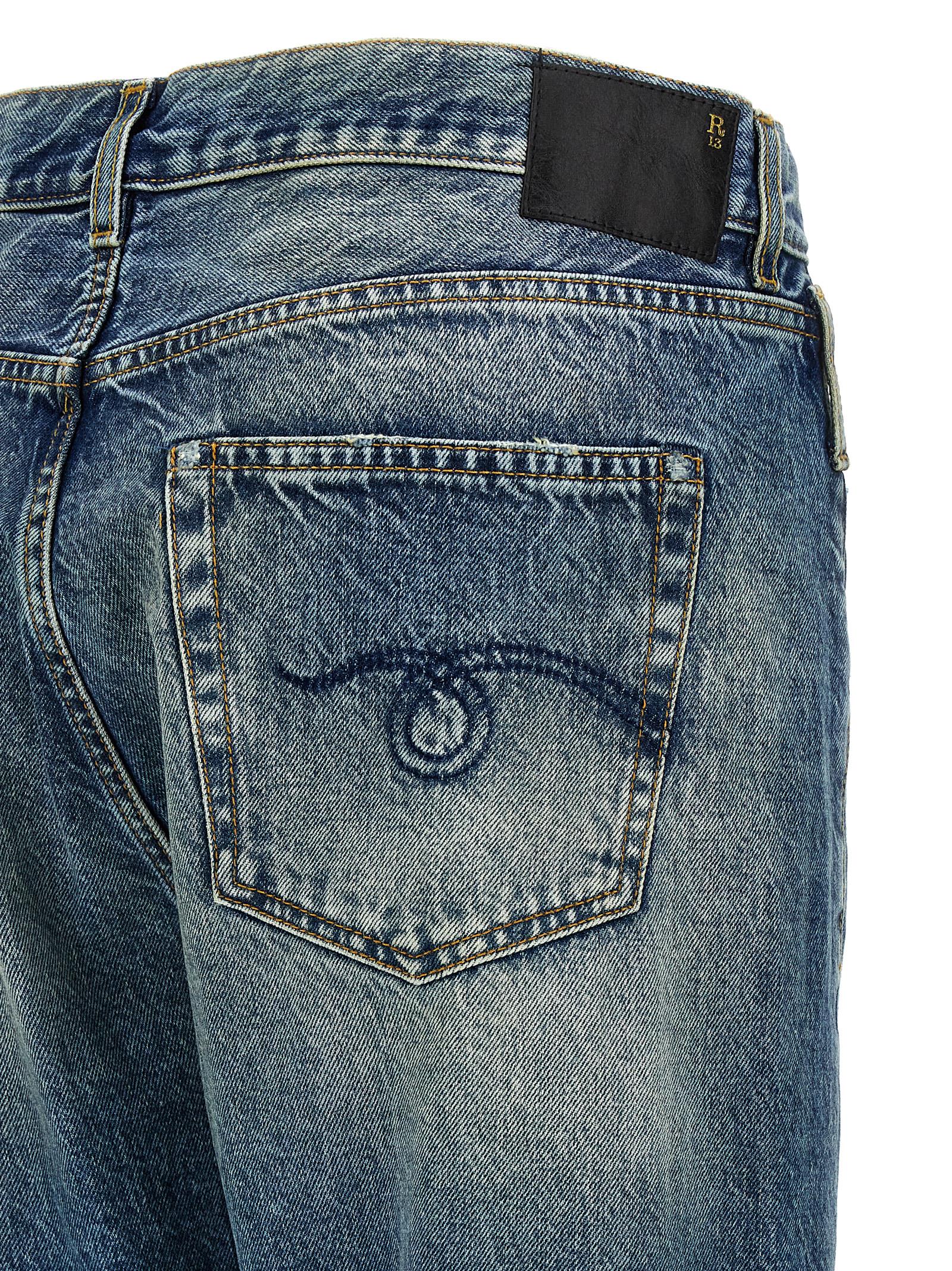 Jeans by R13 for women in cotton denim & patent leather blue & signature presents a tailored silhouette, showcasing a tailored straight-leg and long cut with a refined for a truly tailored aesthetic.