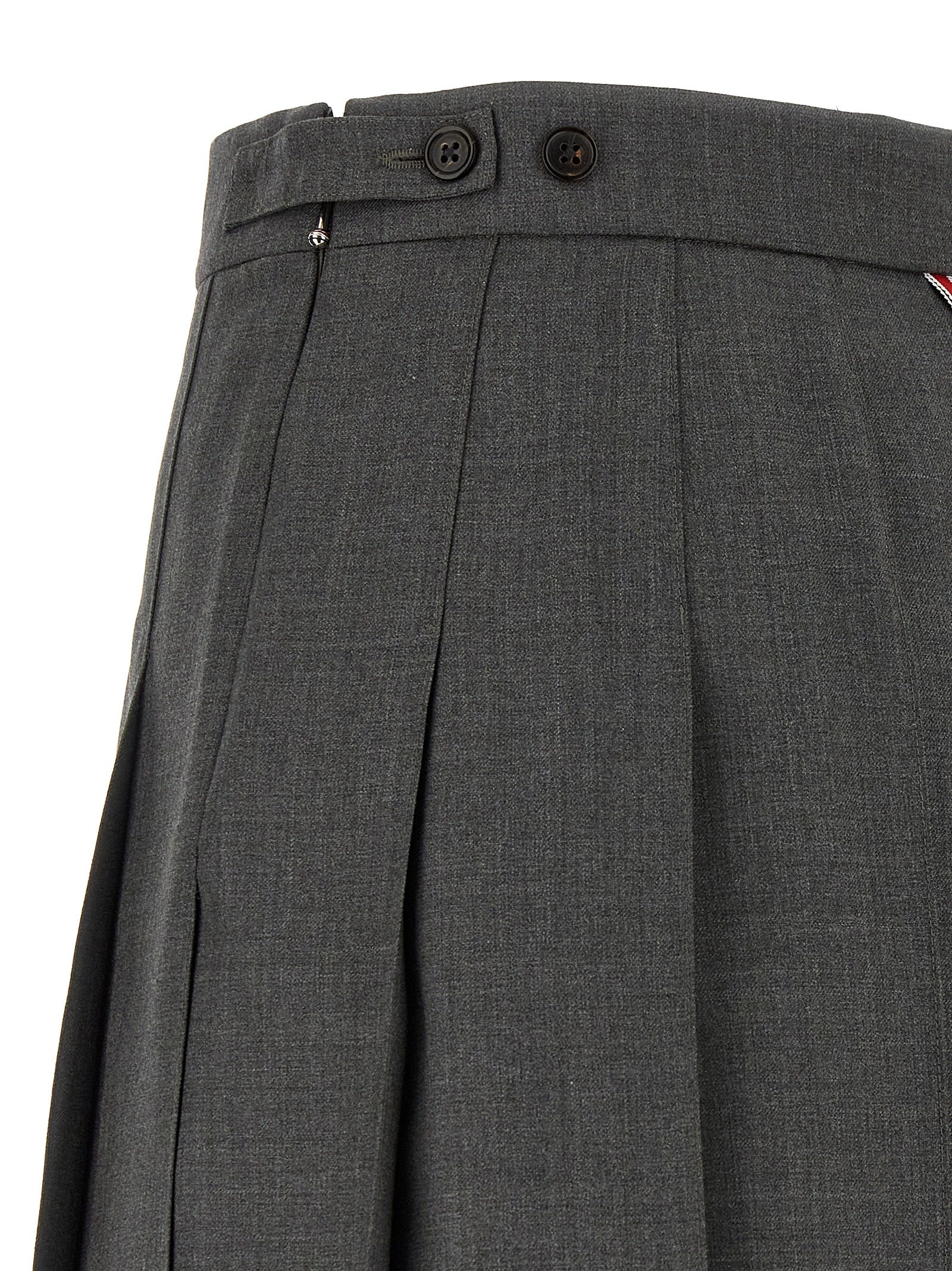 Skirt by Thom Browne for women in wool gray & signature features a contoured silhouette from the Waves Women's Pleated Wool Long Skirt collection, characterized by its contoured long for a contoured finish.