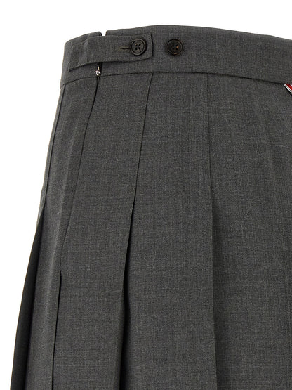 Skirt by Thom Browne for women in wool gray & signature features a contoured silhouette from the Waves Women's Pleated Wool Long Skirt collection, characterized by its contoured long for a contoured finish.