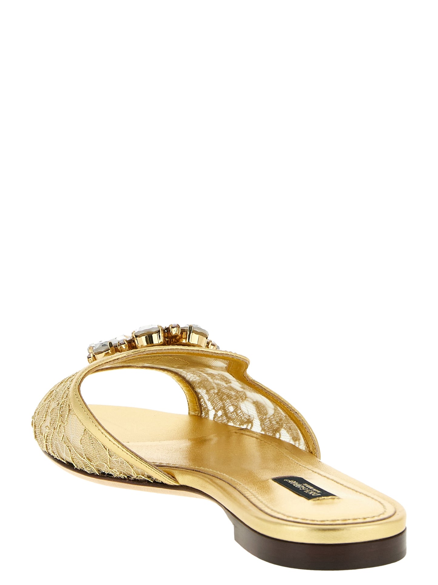 Sliders Sandals Flat Shoes by Dolce & Gabbana for women in polyamide & polyester gold presents a impeccable silhouette as Women's Polyamide & Polyester Sliders Sandals Flat Shoes, artfully designed with a and a impeccable for a refined, upscale finish.