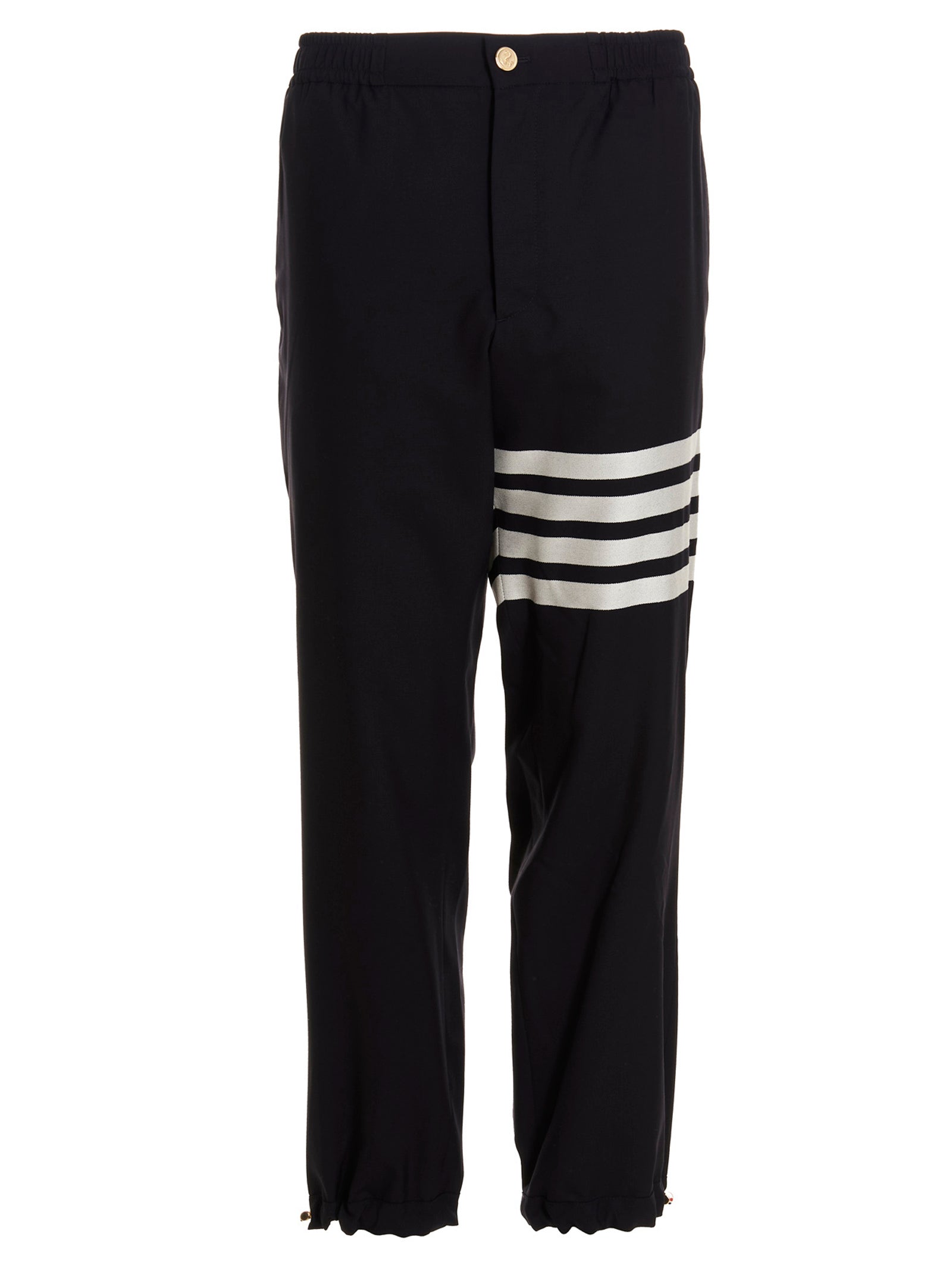 Trousers by Thom Browne for men in wool blue presents a perennial silhouette, meticulously tailored with a athletic cut, long finish, and an elegant .