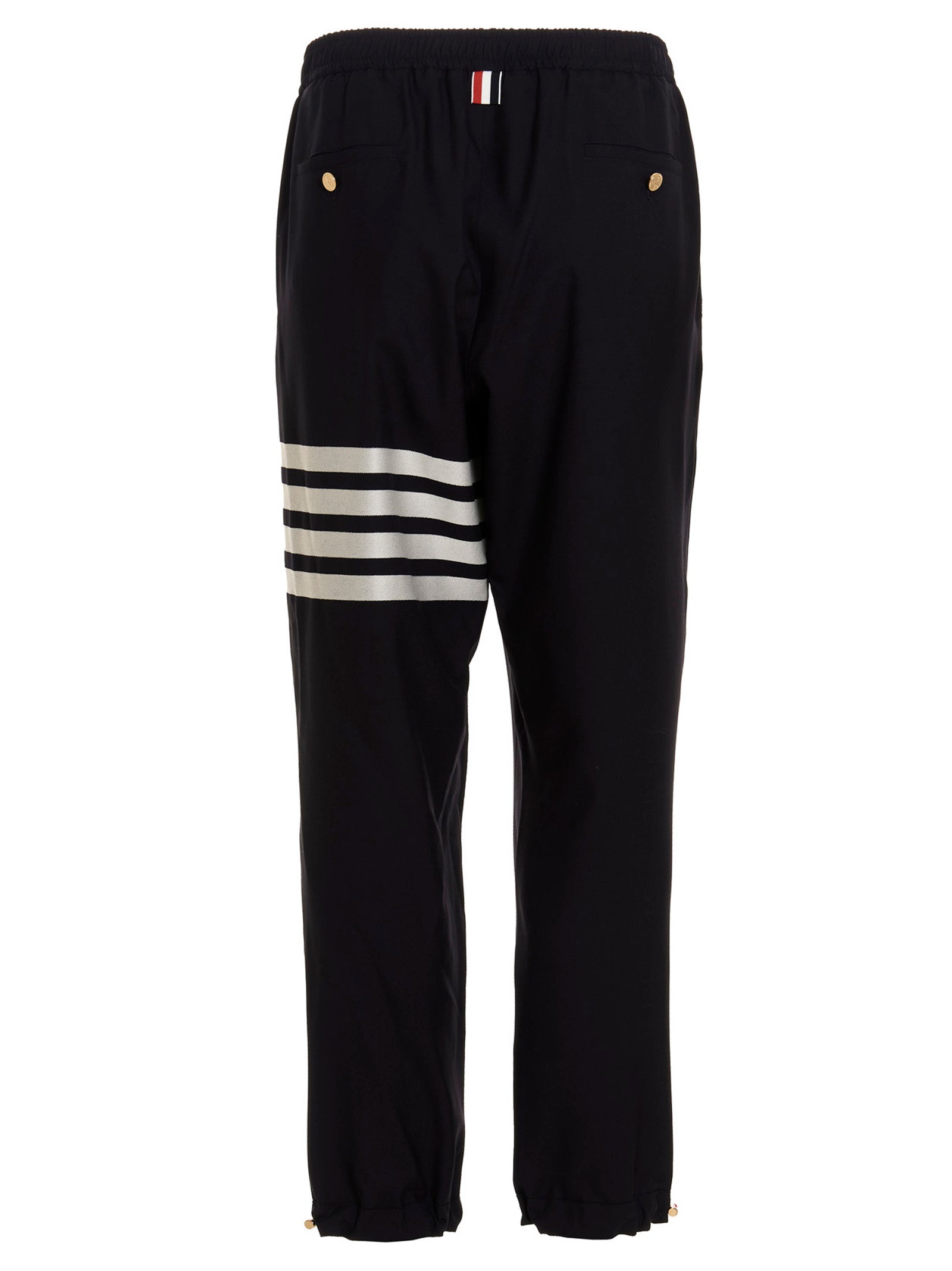 Trousers by Thom Browne for men in wool blue features a sculptural silhouette, showcasing a sculptural athletic and long with a sophisticated for a sculptural finish.