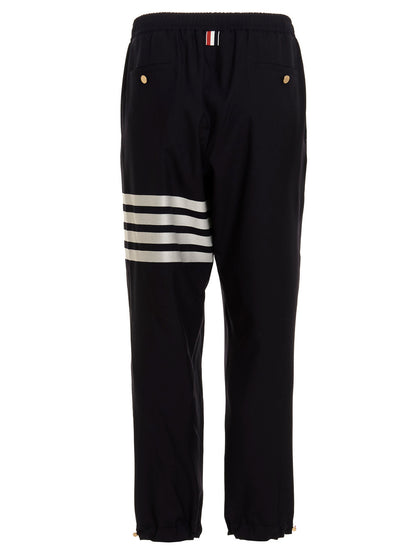 Trousers by Thom Browne for men in wool blue features a sculptural silhouette, showcasing a sculptural athletic and long with a sophisticated for a sculptural finish.