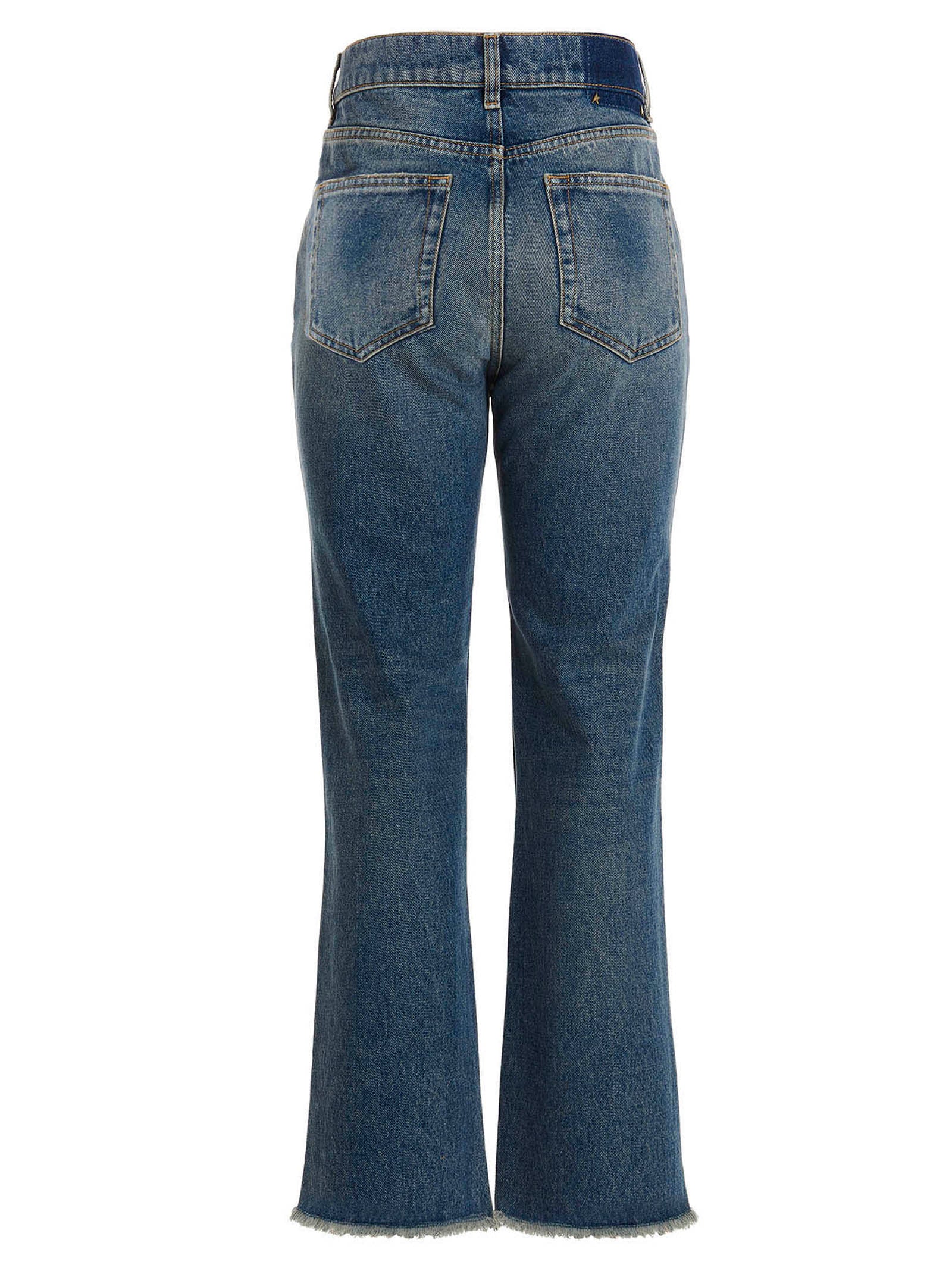 Jeans by Golden Goose for women in denim cotton blue presents a refined pantology silhouette, artfully defined by a refined pantology flared, long, and a sophisticated high rise.