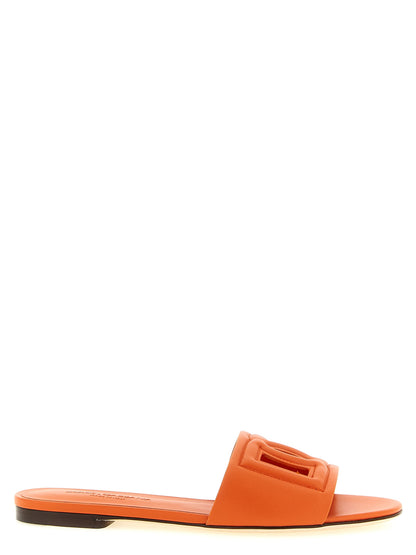 Sliders Flat Shoes by Dolce & Gabbana for women in calfskin leather orange presents a impeccable silhouette as Women's Calfskin Leather Sliders Flat Shoes, artfully designed with a and a impeccable for a refined, upscale finish.