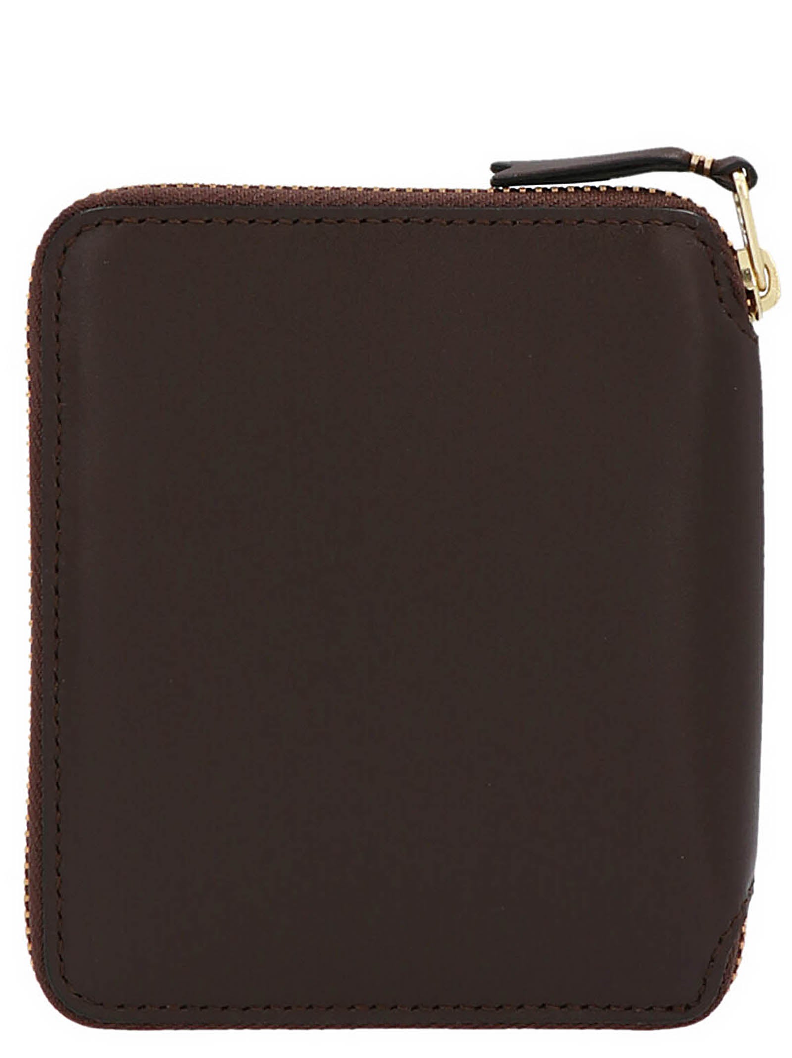 Wallet by Comme Des Garçons for men in leather brown showcases a refined silhouette, artfully capturing the essence of the refined Leather Wallet design with functional .