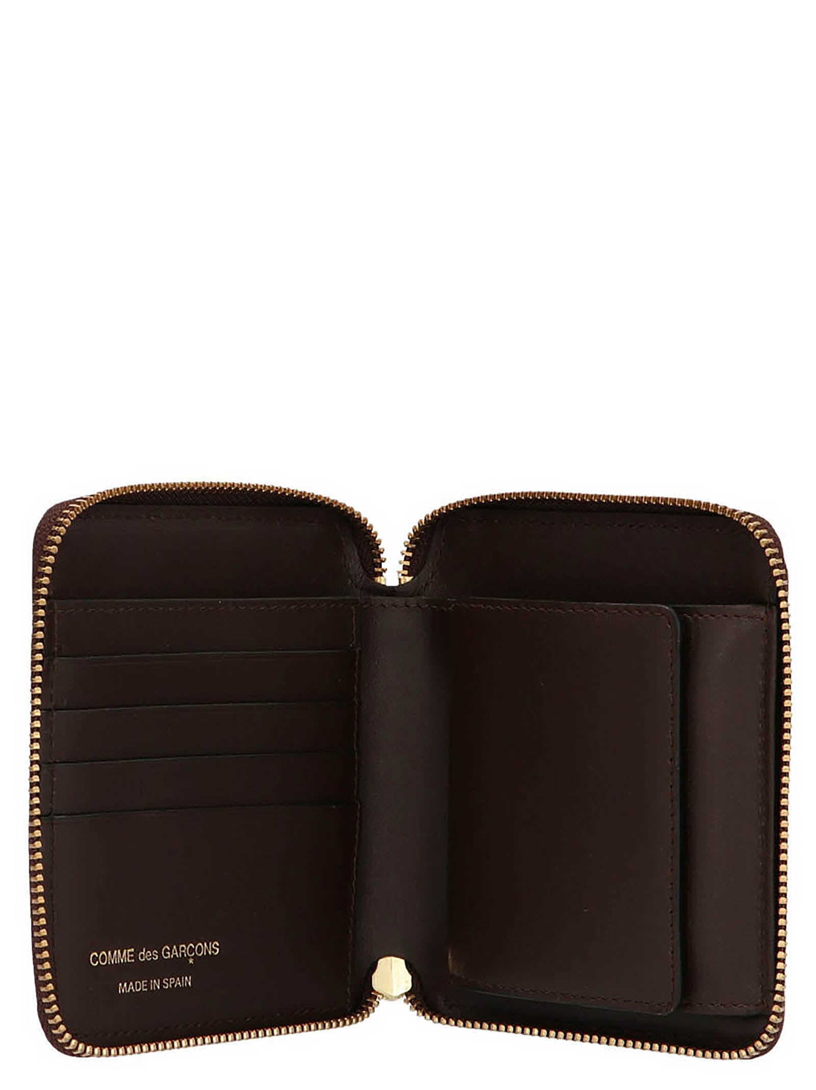 Wallet by Comme Des Garçons for men in leather brown presents a refined silhouette, artfully capturing the essence of the Leather Wallet design with sophisticated for a refined look.