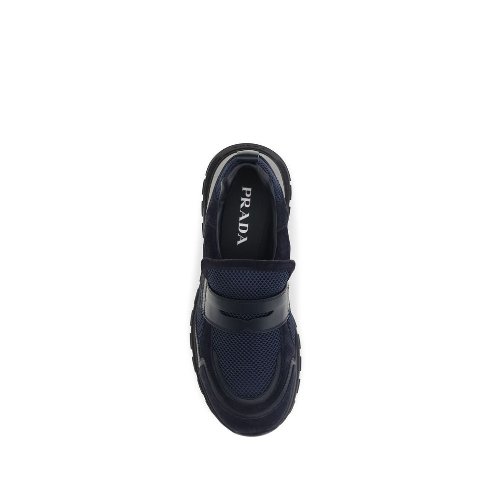 Athletic Sneakers by Prada for men in bos taurus suede calf leather blue showcases a architectural silhouette, artfully capturing the essence of the Men's Athletic Bos Taurus Suede Calf Leather Sneakers with its signature architectural athletic style construction.
